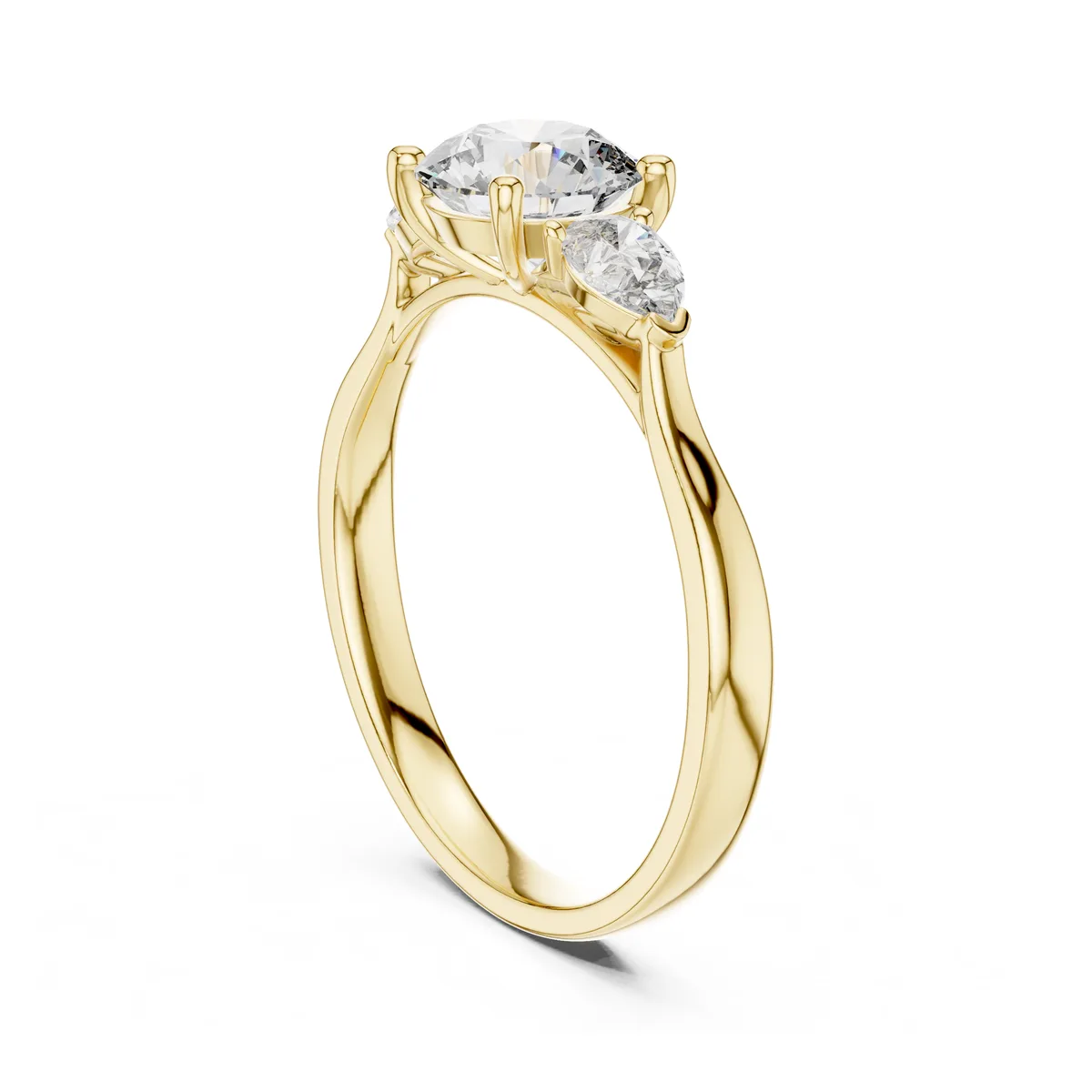 Pear Accent Three-Stone Diamond Ring in yellow gold